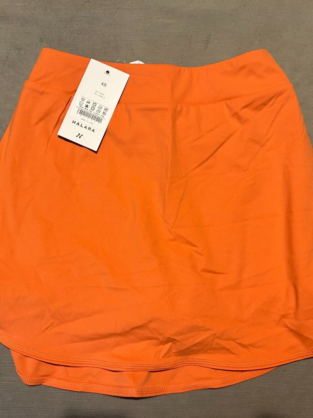 NWT HALARA Softly Zero Airy Crossover Pocket 2in1 Tennis Skirt Exotic Orange XS